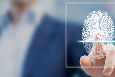 Finger touching a thumbprint on a 3D transparent screen 