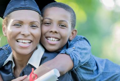 Female Adult Graduate with Son