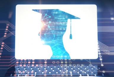 Silhouette of graduate on computer screen