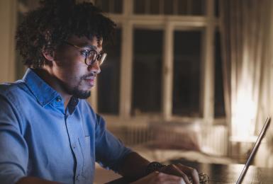 Student on laptop at home 