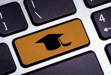Keyboard featuring a graduation cap key