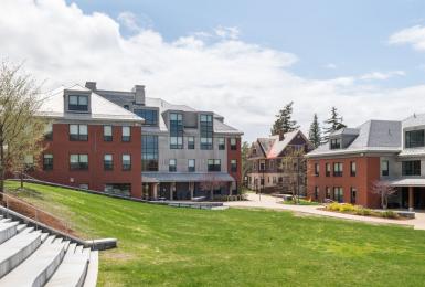 Brick buildings and a grass lawn at Champlain College's Burlington campus