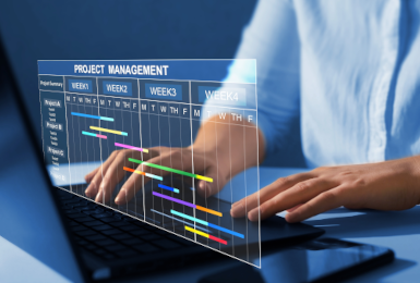 Project manager working on laptop
