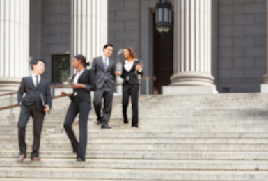 professionals walk down steps 