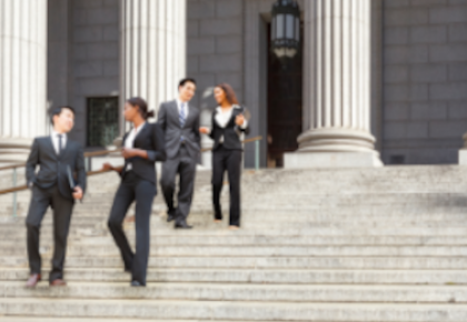 professionals walk down steps 