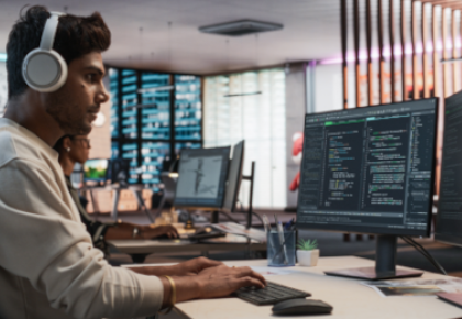 computer programmer working on computer