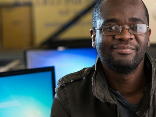 Adult male student in computer lab