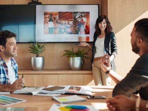 Team of two men and two women discussing marketing concept