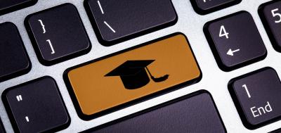 Keyboard featuring a graduation cap key