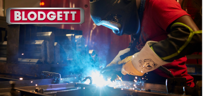 Blodgett logo in upper left over an image of a worker welding 