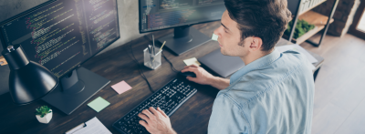 computer programmer coding on a computer