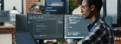 computer programmer coding on a computer