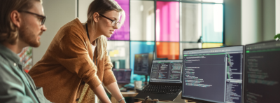 software developers looking a computer 