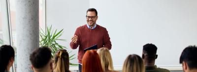business leader speaking to employees 