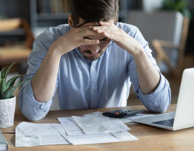 Male project manager reviewing crisis management plan