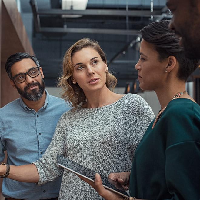 Woman meeting with her colleagues