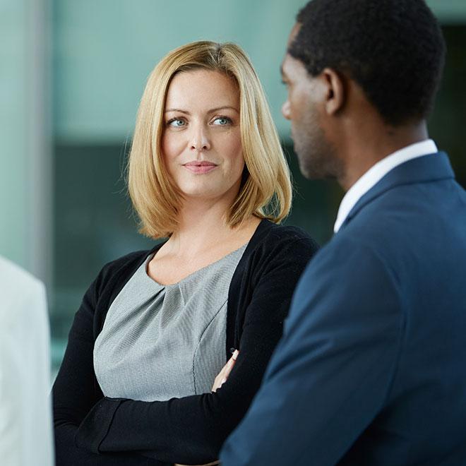 Business management professional at the office in front of white board