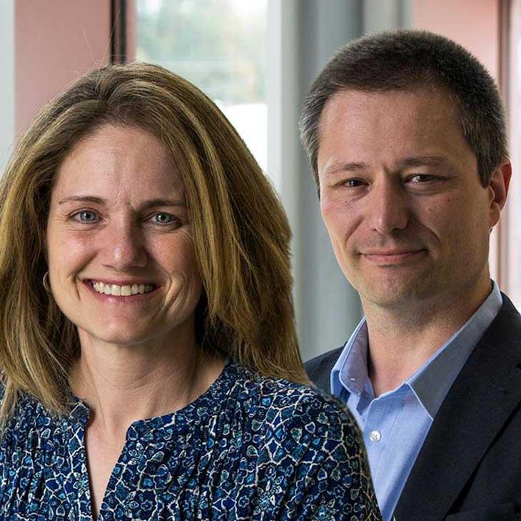 Cybersecurity leadership standing together smiling at camera
