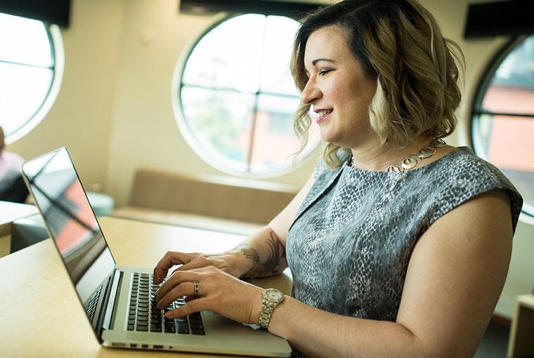 Female student working on laptop